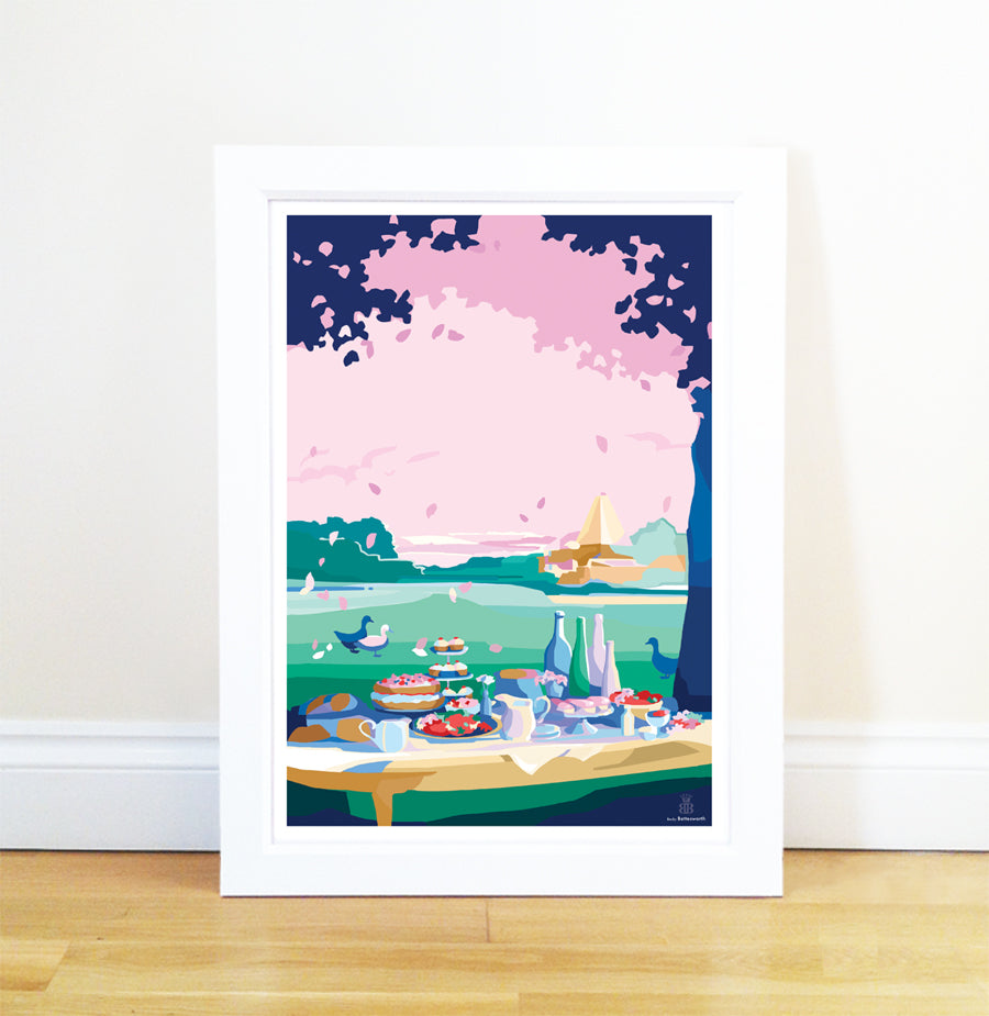 Becky Bettesworth artwork depicts a colourful picnic scene with food, drinks, and birds under trees against a landscape with a pink sky.